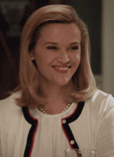 Woman In Pink Dress Talking To Man In Yellow Shirt GIF