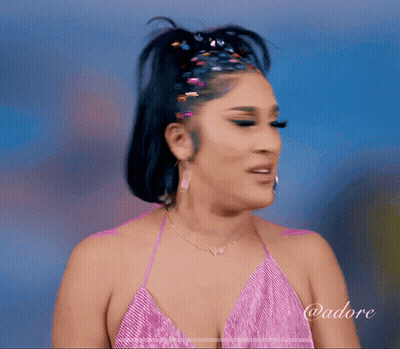 Woman In Pink Dress With Adore On Arm GIF