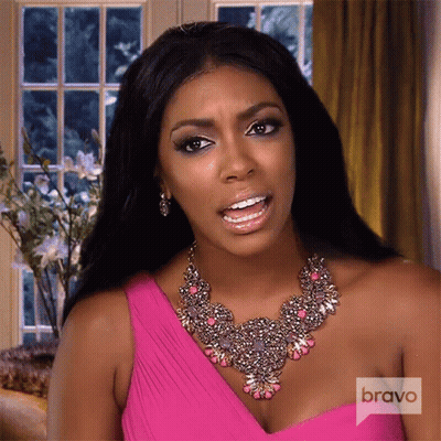Woman In Pink Dress With Bravo Necklace GIF