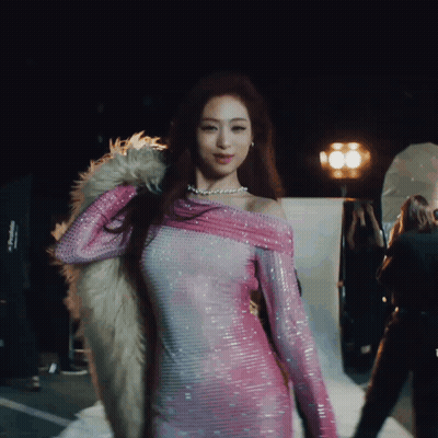 Woman In Pink Dress With Fur Collar GIF
