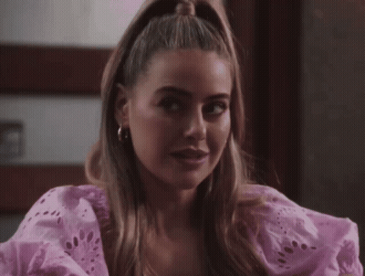 Woman In Pink Dress With Ponytail GIF