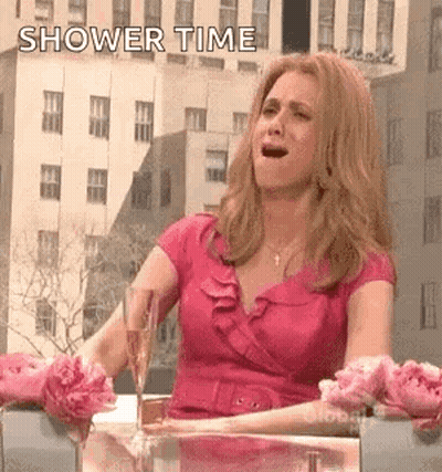 Woman In Pink Dress With Wine And Flowers GIF