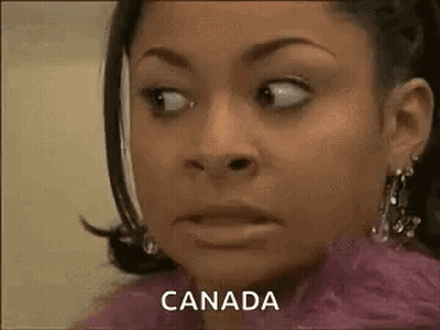Woman In Pink Fur Coat And Earrings Making Funny Face GIF
