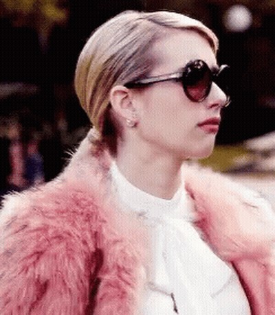 Woman In Pink Fur Coat And Sunglasses GIF
