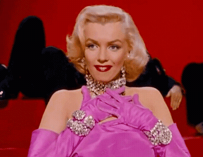 Woman In Pink Gloves And Pink Dress GIF