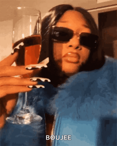 Woman In Pink Hat And Gloves By Pink Wall GIF