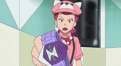 Woman In Pink Hat Holding Purple Cube GIF