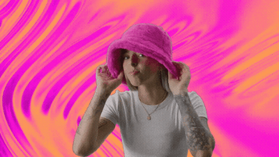 Woman In Pink Hat Making Funny Face GIF
