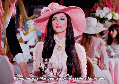 Woman In Pink Hat Says Being Here Is Like Being A Princess In A Fairy Tale GIF