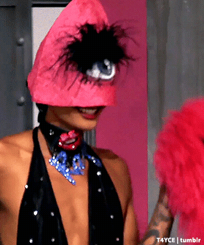 Woman In Pink Hat With Feathers GIF