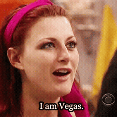 Woman In Pink Headband And Pink Scarf Saying I Am Vegas GIF