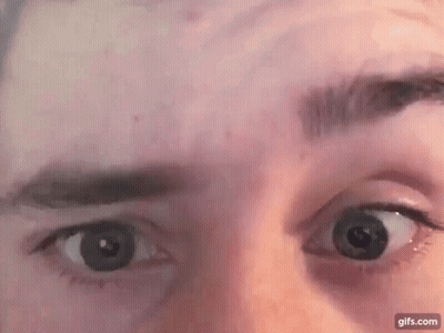 Woman In Pink Hoodie Close Up GIF