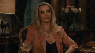 Woman In Pink Jacket Holding Martini GIF