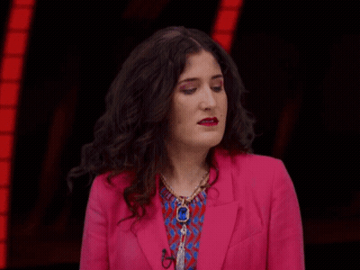 Woman In Pink Jacket Making Funny Face GIF