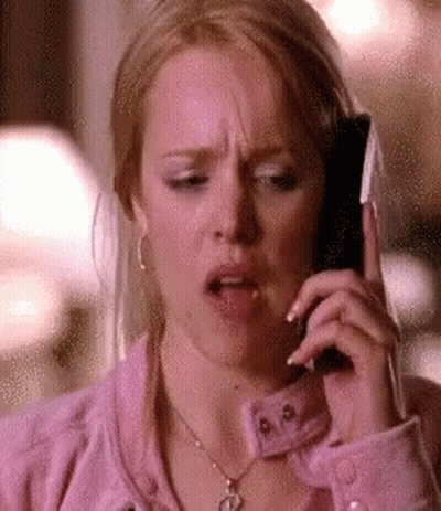 Woman In Pink Jacket On Cellphone GIF