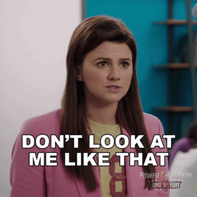Woman In Pink Jacket Saying Don't Look At Me GIF