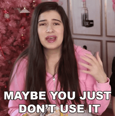 Woman in Pink Jacket Saying Maybe You Don't Use It