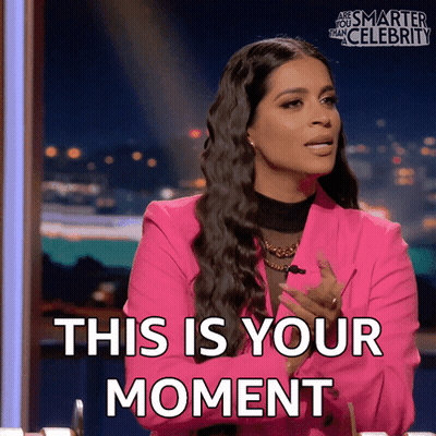 Woman in Pink Jacket Saying This Is Your Moment
