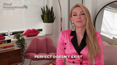 Woman In Pink Jacket Says Perfect Doesn't Exist GIF
