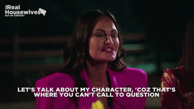 Woman In Pink Jacket Talking GIF