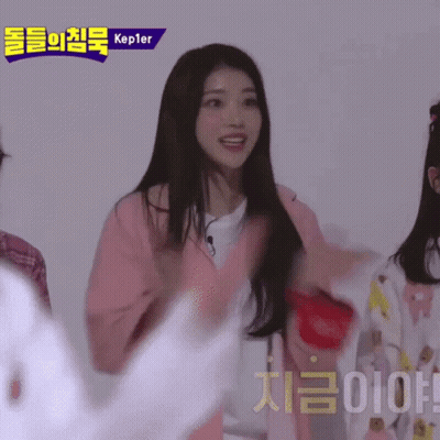Woman In Pink Jacket With Kepler Sign GIF