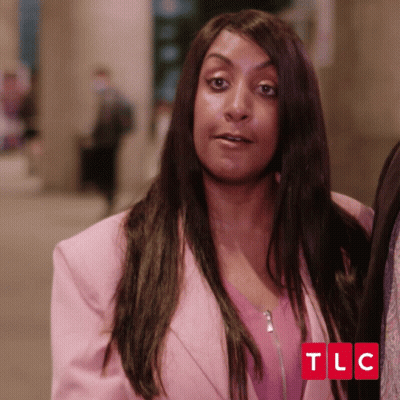 Woman In Pink Jacket With TLC GIF