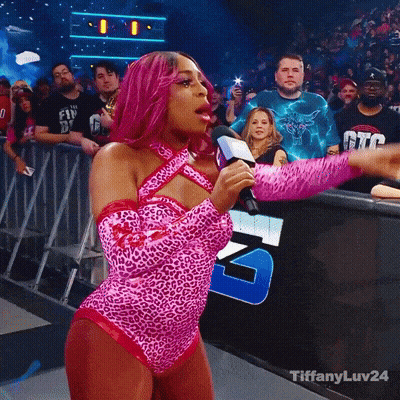 Woman In Pink Leopard Bodysuit Holding Microphone #Tiffanyluv24 GIF