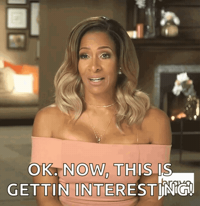 Woman In Pink Off Shoulder Dress Saying Ok GIF