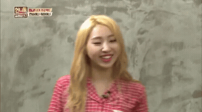 Woman In Pink Plaid Shirt Making Funny Face GIF