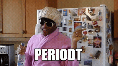 Woman In Pink Robe And Hat Pointing At Periodt GIF