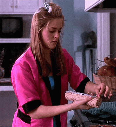 Woman In Pink Robe Cooking GIF