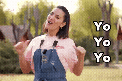 Woman In Pink Shirt And Blue Overalls Singing Yo Yo Yo Yo GIF