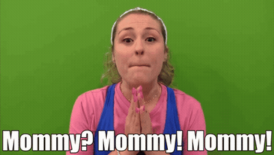 Woman In Pink Shirt And Blue Tank Saying Mommy GIF