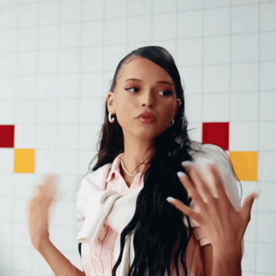 Woman In Pink Shirt And White Sweater GIF