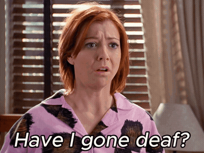 Woman In Pink Shirt Asking If She's Gone Deaf GIF