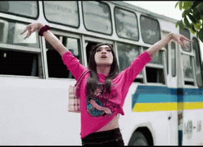 Woman In Pink Shirt By Bus Number 4 GIF