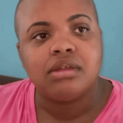Woman In Pink Shirt Close Up GIF