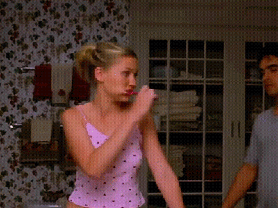 Woman In Pink Shirt Close Up GIF