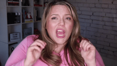 Woman In Pink Shirt Funny Face Slow Your Scroll GIF