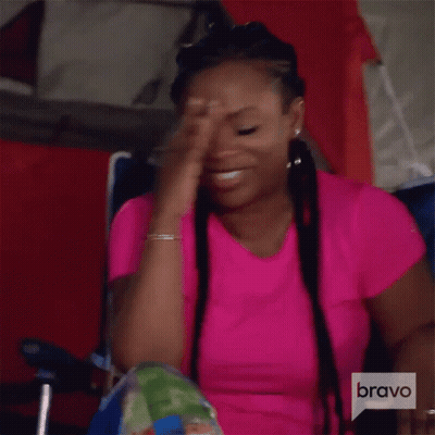 Woman In Pink Shirt Hand On Face GIF