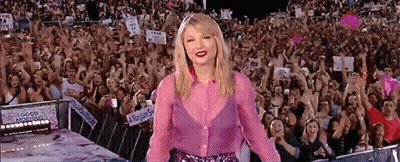 Woman In Pink Shirt Holding Good Morning Sign GIF