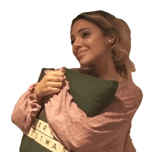 Woman In Pink Shirt Holding Merry Christmas Pillow Sticker