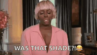Woman In Pink Shirt Laughing Saying Was That Shade GIF