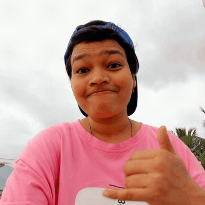 Woman In Pink Shirt Number 33 Giving Thumbs Up GIF