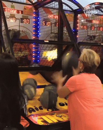 Woman In Pink Shirt Playing Game Scoreboard Stage 1 GIF