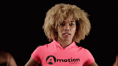 Woman In Pink Shirt Saying A Motion Dance GIF
