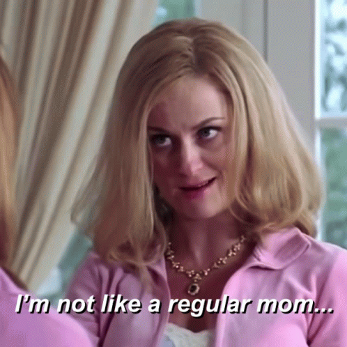 Woman in Pink Shirt Saying I'm Not Like a Regular Mom