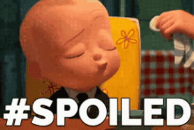 Woman In Pink Shirt Saying Spoiled Holding Sprite Sign In Crowd GIF