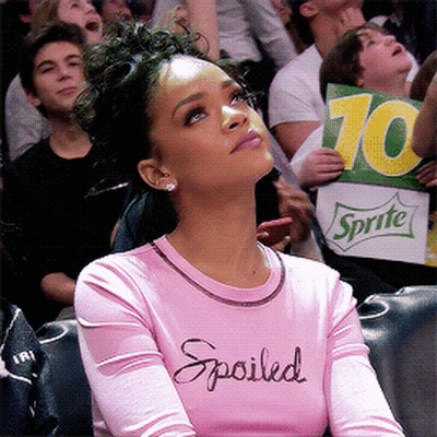 Woman In Pink Shirt Saying Spoiled In Crowd GIF