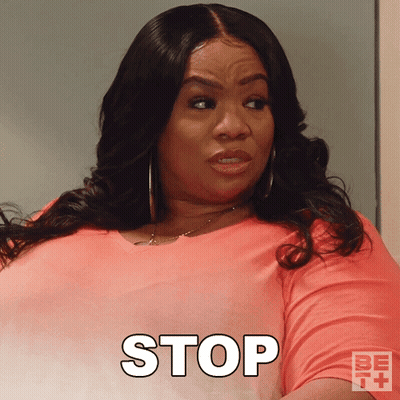 Woman In Pink Shirt Saying Stop GIF